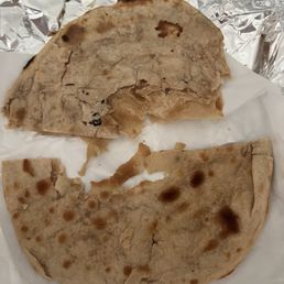 Weird colored, soggy, nasty plain naan