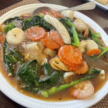 Baylee Thai Cuisine - So good. Radna noodles seafood: stir fried flat rice noodles topped with savory gravy - Thai Near Me - Cranston, Rhode Island