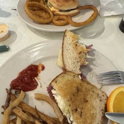 Cafe 339 - Avocado burger with onion rings and a Ruben with fries.
