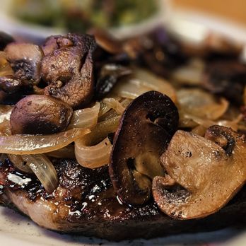 Texas Roadhouse - Ribeye with sauteed onions and mushrooms - Steakhouses Near Me - Danville, Virginia Texas Roadhouse - Ribeye with sauteed onions and mushrooms - Steakhouses Near Me - Danville, Virginia