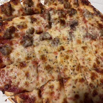 Nino's Pizza - Medium cheese $ 1/2 Cheese 1/2 Sausage Pizza - Pizza Near Me - Alsip, Illinois