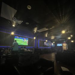 Sultana Hookah Lounge - The large TVs playing the soccer game for everyone in the lounge.