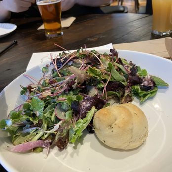 DeSalvo's Pizza - Seasonal salad with garlic knot - Pizza Near Me - Evanston, Illinois DeSalvo's Pizza - Seasonal salad with garlic knot - Pizza Near Me - Evanston, Illinois