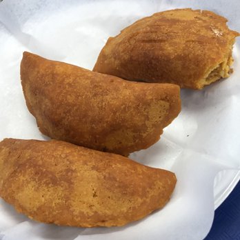 Sterling Pollo A La Braza - three calzones on a paper plate - Peruvian Near Me - Sterling, Virginia Sterling Pollo A La Braza - three calzones on a paper plate - Peruvian Near Me - Sterling, Virginia