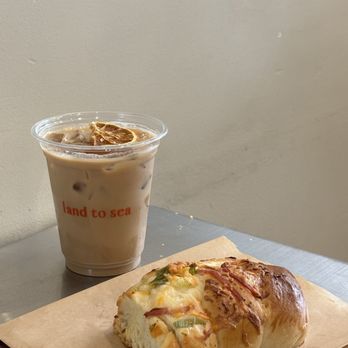 Land to Sea - IG: @nom.noms.only | mandarin latte & scallion twist - Coffee & Tea Near Me - Brooklyn, New York Land to Sea - IG: @nom.noms.only | mandarin latte & scallion twist - Coffee & Tea Near Me - Brooklyn, New York