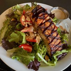 The Bistro K - Salmon with balsamic glaze over Briosa salad.
