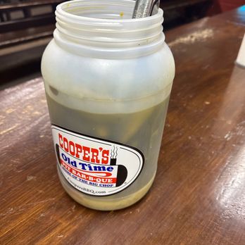 Cooper's Old Time Pit Bar-B-Que - Huge container of pickled jalepenos with tongs! - Barbeque Near Me - Llano, Texas