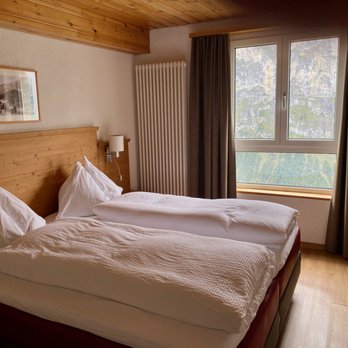 Hotel Edelweiss Mürren - Immaculate beds. - Hotels & Travel Near Me - Mürren, BE Hotel Edelweiss Mürren - Immaculate beds. - Hotels & Travel Near Me - Mürren, BE
