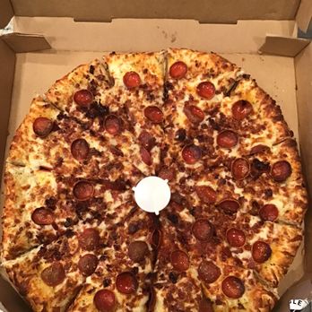 Round Table Pizza - Their feast of flavors pizza, this is what I got and the next photo and is what they advertise - Pizza Near Me - Manteca, California Round Table Pizza - Their feast of flavors pizza, this is what I got and the next photo and is what they advertise - Pizza Near Me - Manteca, California