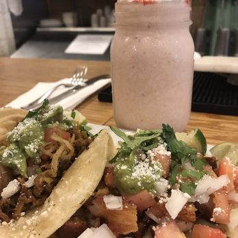 Empanada Loca - Shredded pork and pork belly street taco with fresh guacamole on top. Summer Love smoothie. - Empanadas Near Me - Brooklyn, New York Empanada Loca - Shredded pork and pork belly street taco with fresh guacamole on top. Summer Love smoothie. - Empanadas Near Me - Brooklyn, New York