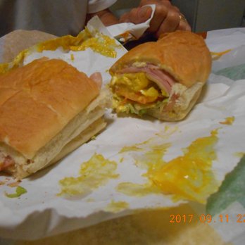 Subway - a half eaten sub sandwich on a piece of wax paper - Sandwiches Near Me - Picayune, Mississippi