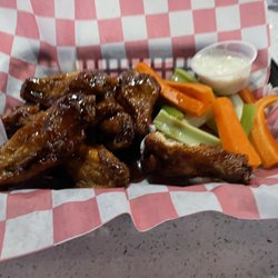 Q Bar & Grill - Chicken wangs w/bourbon sauce + celery, carrot sticks + ranch dressing