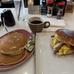 TBD breakfast sandwich, phenomenal! The coffee is superb and the gluten free pancakes were delicious and did not taste gluten free TBD breakfast sandwich, phenomenal! The coffee is superb and the gluten free pancakes were delicious and did not taste gluten free