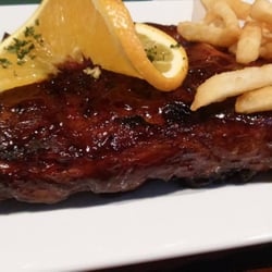 Paradise Restaurant Bar & Grille - Barbecue Smoked Ribs