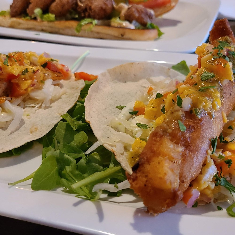 Off The Hook Fishbar - Grilled shrimp taco, and battered fish taco. - Fish & Chips Near Me - Toronto, Ontario Off The Hook Fishbar - Grilled shrimp taco, and battered fish taco. - Fish & Chips Near Me - Toronto, Ontario