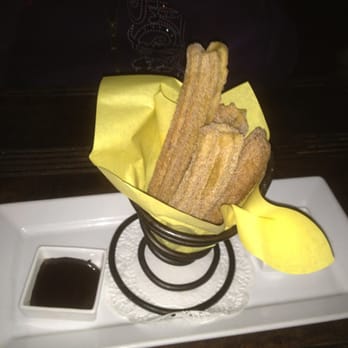Gabbi's Mexican Kitchen - House made Churros. Great chocolate chili sauce and caramel sauce (hidden behind the wrapper) - Mexican Near Me - Orange, California Gabbi's Mexican Kitchen - House made Churros. Great chocolate chili sauce and caramel sauce (hidden behind the wrapper) - Mexican Near Me - Orange, California