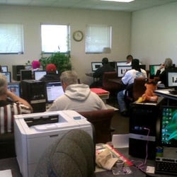 Clients use free computers and Internet access at our DeWitty Center.