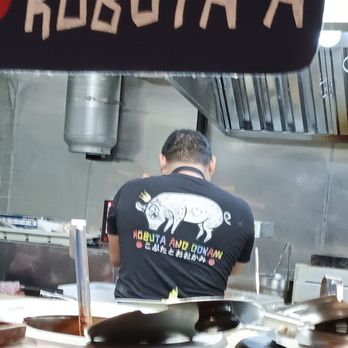 Kobuta And Ookami - Cook and five staff behind counter laughing, smiling and really seeming to enjoy their work. - Japanese Near Me - Seattle, Washington