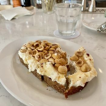 Willa's - This is the ricotta toast. It was good but very plain looking. For $14.00.. it was pricey for one slice of bread. - New American Near Me - Tampa, Florida Willa's - This is the ricotta toast. It was good but very plain looking. For $14.00.. it was pricey for one slice of bread. - New American Near Me - Tampa, Florida