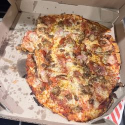 Domino's - A pile of pizza.