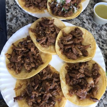 Tacos El Chuleton - Al pastor tacos before putting onion and cilantro - Mexican Near Me - Perris, California Tacos El Chuleton - Al pastor tacos before putting onion and cilantro - Mexican Near Me - Perris, California