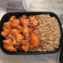 Asian Cuisine Express - Sesame Chicken plate (can't see my egg roll but it come with an egg roll too)