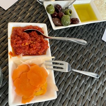 The Trattoria - Sundried tomato tapenade, pickled vegetables, olives, olive oil and homemade ricotta - Italian Near Me - St James, New York The Trattoria - Sundried tomato tapenade, pickled vegetables, olives, olive oil and homemade ricotta - Italian Near Me - St James, New York