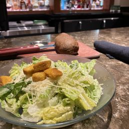 Caesar salad and pumpernickel