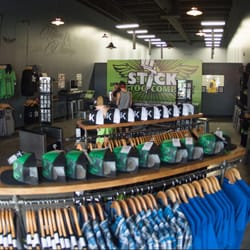 STICK Tattoo Company - Inside retail area of Stick Tattoo Company featuring such brands as Sullen Clothing, Ink Addict, Metal Mulisha and more.