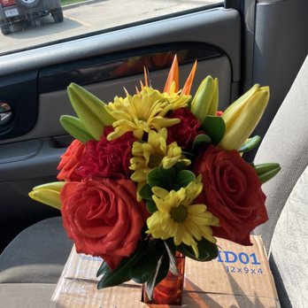Flowers & Friends - The bride's bouquet with roses, tiger lilies, and the must have: birds of paradise peeking in from the back! - Florists Near Me - Pleasant Hill, Missouri