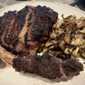 Adrestia - 40oz Tomahawk Bone-In Ribeye Steak - Hard Seared Mushrooms, Creamy Brandy Sauce and sliced - New American Near Me - Sunnyvale, California