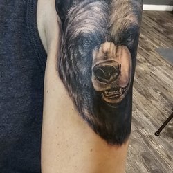 Inspired Ink Tattoo Shop - Bear tattoo, more to add.
Lisa Johnson does alot of animal portraits. Email her: inspired.ink1@gmail.com