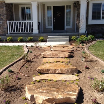 Vargas Brothers - a stone path in front of a house - Landscaping Near Me Vargas Brothers - a stone path in front of a house - Landscaping Near Me