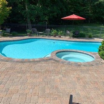 Surmount Contractors - a pool and patio area - Landscaping Near Me - Wethersfield, Connecticut Surmount Contractors - a pool and patio area - Landscaping Near Me - Wethersfield, Connecticut