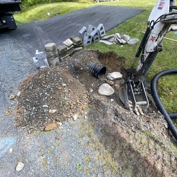 TLC Tree Service - Drainage ditch covert pipe repair. Before retaining wall. - Tree Services Near Me - Dingmans Ferry, Pennsylvania TLC Tree Service - Drainage ditch covert pipe repair. Before retaining wall. - Tree Services Near Me - Dingmans Ferry, Pennsylvania