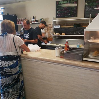 Caribbean Sandwich Shop - customers ordering food - Sandwiches Near Me - Tampa, Florida Caribbean Sandwich Shop - customers ordering food - Sandwiches Near Me - Tampa, Florida