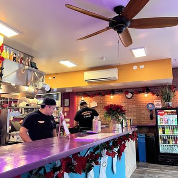 Astoria Taco Factory - customers at the counter - Tacos Near Me - Astoria, New York Astoria Taco Factory - customers at the counter - Tacos Near Me - Astoria, New York