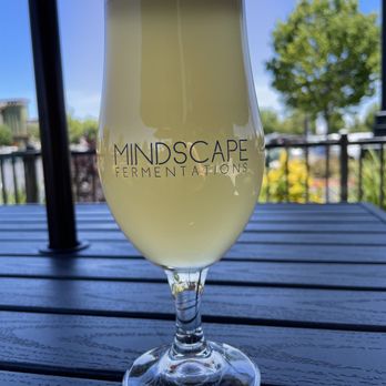 Mindscape Fermentations - a glass of wine on a table - Breweries Near Me - Rocklin, California
