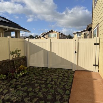 Island Green - After: concrete, landscaping, sprinklers, vinyl gates + fence - Landscaping Near Me Island Green - After: concrete, landscaping, sprinklers, vinyl gates + fence - Landscaping Near Me