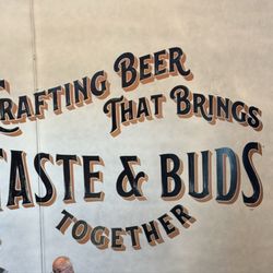 Rendezvous Junction Brewing - Wall with motto
