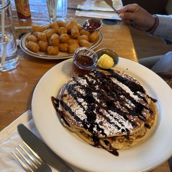 The Wayward Cafe - Chocolate chip pancakes with a side of tater tots - Breakfast & Brunch Near Me - Seattle, Washington
