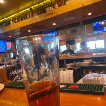 Roosters - Enjoying a beer at the bar. - American Near Me - Louisville, Kentucky Roosters - Enjoying a beer at the bar. - American Near Me - Louisville, Kentucky