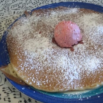 Ruth's Cafe - "One huge pancake" with  cheesecake, topped with strawberry.  Great as an add on, meal, or share as a dessert. Delicious. Get it - Breakfast & Brunch Near Me - Indianapolis, Indiana