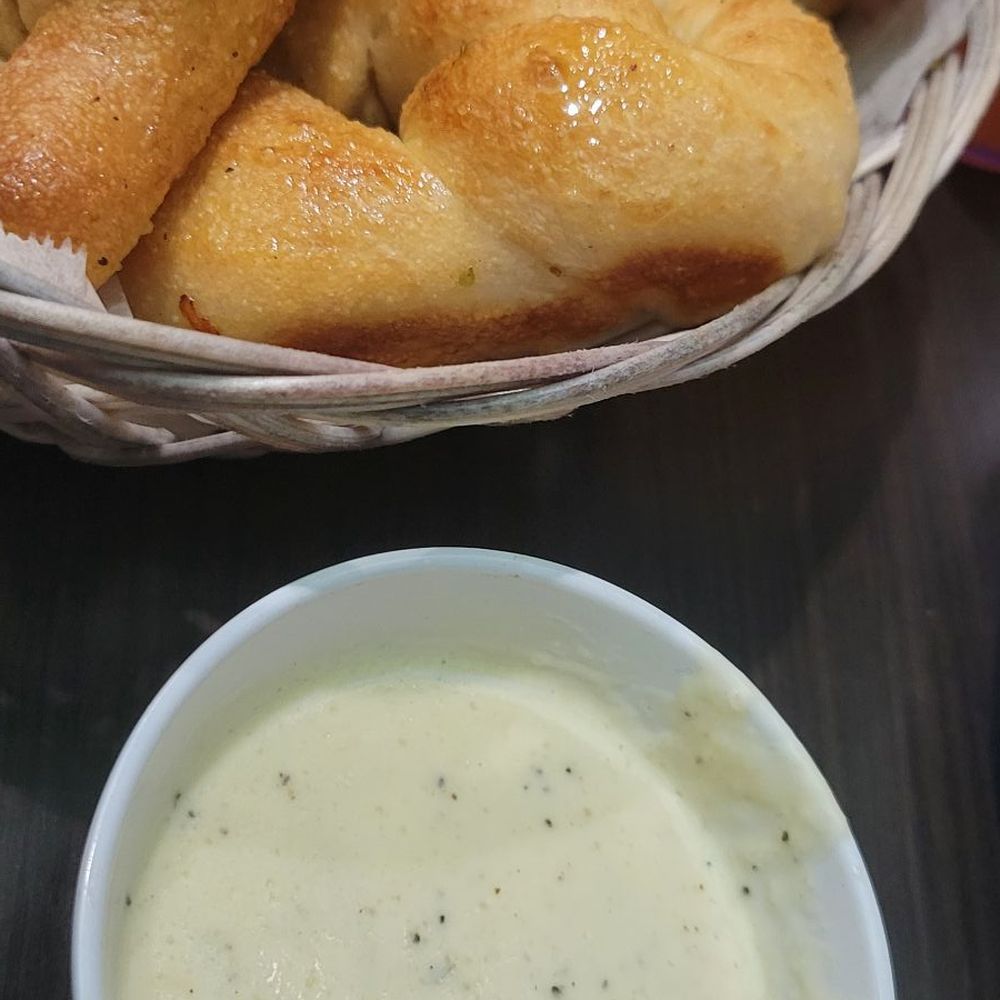 Adriatic Cafe - Knotted Bread with Alfredo Sauce - Italian Near Me - Jersey Village, Texas