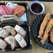 Photo of Maruta Shoten - Seattle, WA, United States. Sashimi, salmon roll, korokke, and shrimp