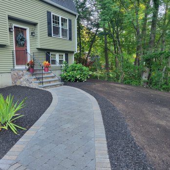 Topping Landscaping - a walkway in front of a house - Landscaping Near Me - Billerica, Massachusetts Topping Landscaping - a walkway in front of a house - Landscaping Near Me - Billerica, Massachusetts