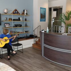 Raphael's Barber Shop - Live classical guitar by one of the barber/stylists