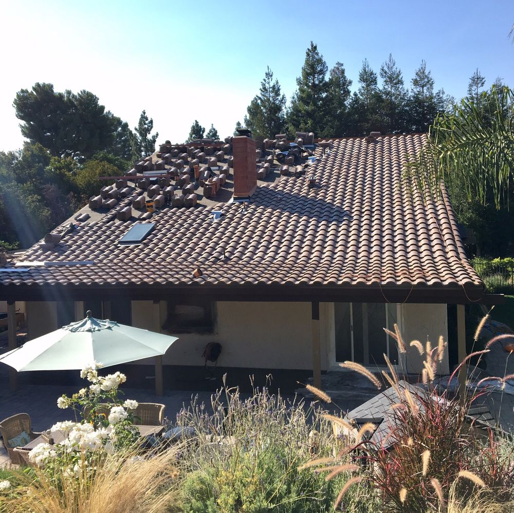 Slide of Shelter Roofing and Solar