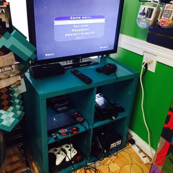 Gotham City Games - Some old consoles on one shelf. - Video Game Stores Near Me - Brooklyn, New York Gotham City Games - Some old consoles on one shelf. - Video Game Stores Near Me - Brooklyn, New York