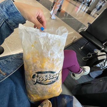 Garrett Popcorn Shops - The only snack for a flight to Greece from ORD, you're doing it wrong if you do it any other way - Popcorn Shops Near Me - Chicago, Illinois Garrett Popcorn Shops - The only snack for a flight to Greece from ORD, you're doing it wrong if you do it any other way - Popcorn Shops Near Me - Chicago, Illinois